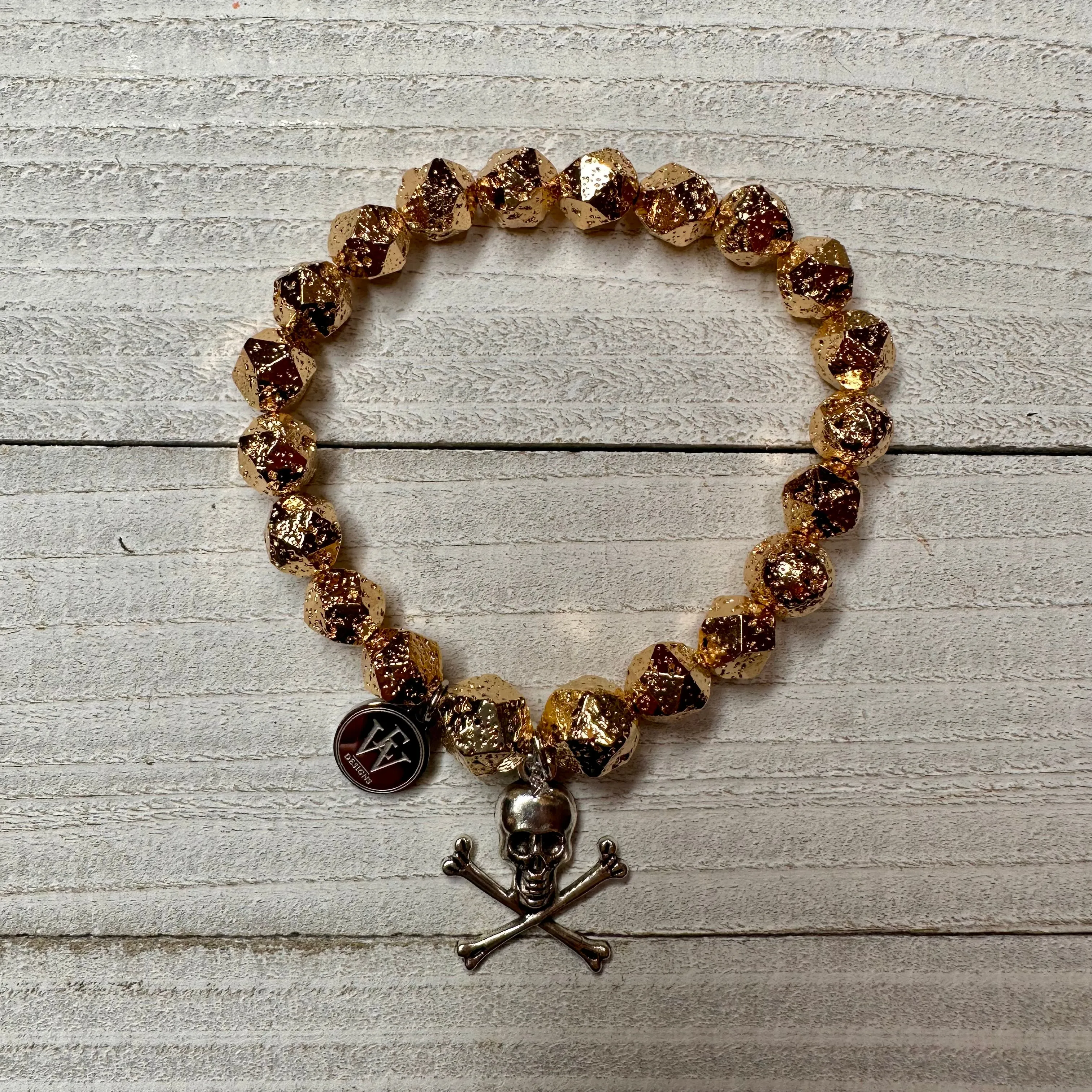 Faceted Gold Plated Lava Rock Beads Bracelet with a Metal Crossed Bones and Skull Charm 410-09 | Erika Williner Designs