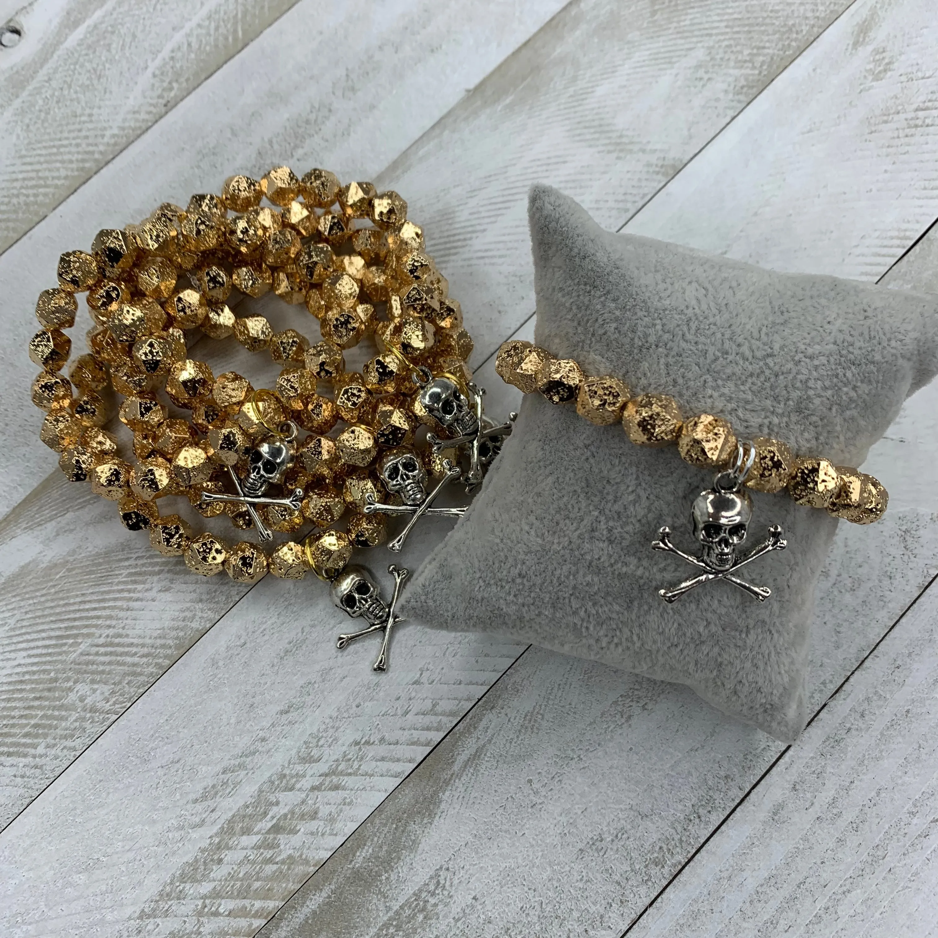 Faceted Gold Plated Lava Rock Beads Bracelet with a Metal Crossed Bones and Skull Charm 410-09 | Erika Williner Designs