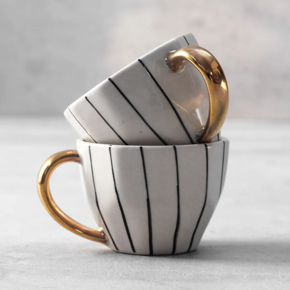 Home Artisan Iris Black Vertical Striped Ceramic Cup with Golden Handle - Set of 2