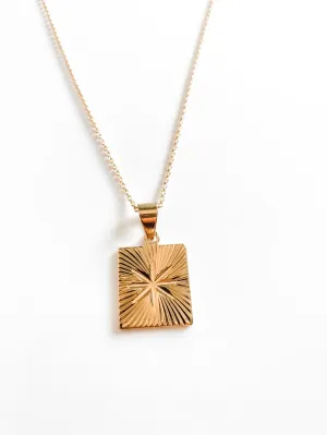 THE RUBY STARBURST PENDANT